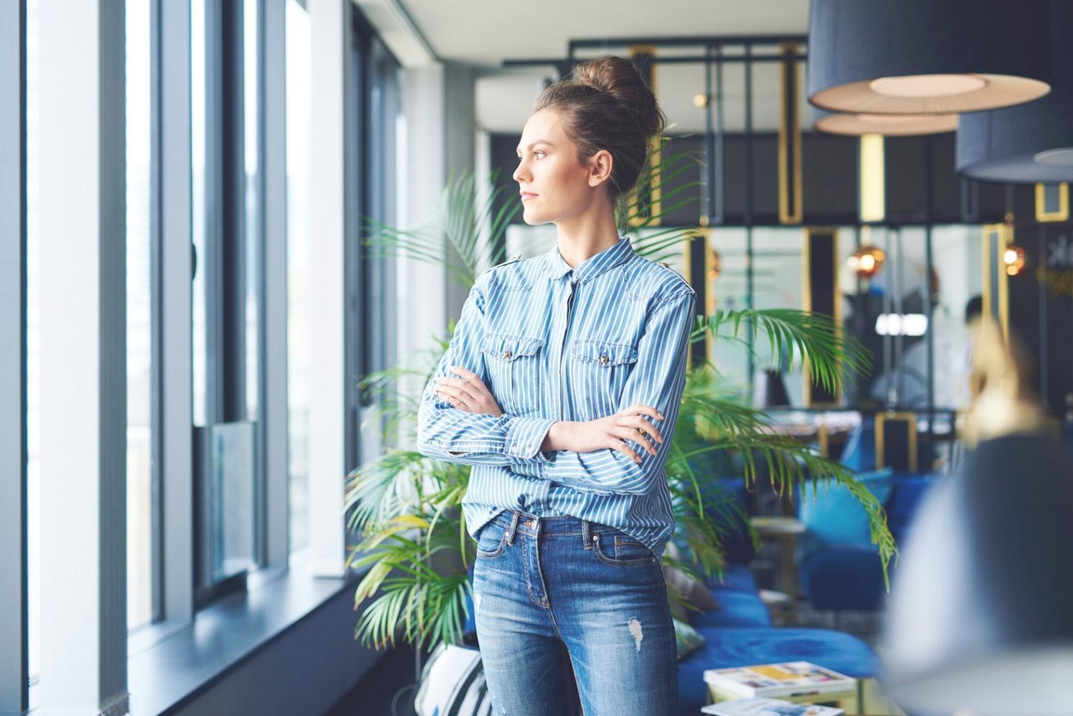 Close-up of financial calculator and trading journal with handwritten notes