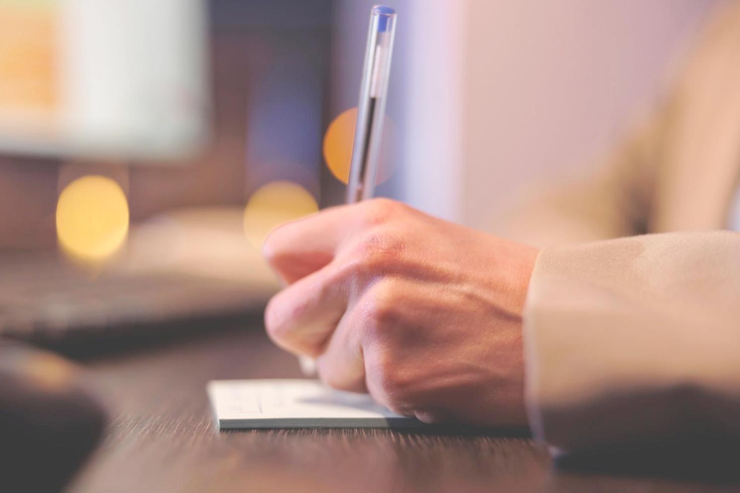 Trading position sizing analysis on multiple monitors showing risk calculations